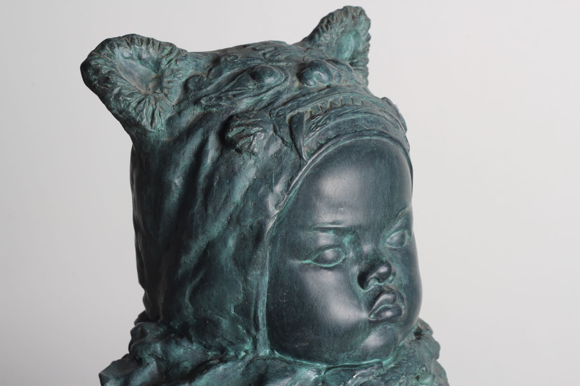 铸铜铜绿婴儿头像雕塑